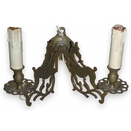 Two-light wall light, in bronze. Available from  Moinat SA  - Antiques and home décor