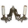  Applique à deux lumières, en bronze. sur  Moinat SA  - Antiquités décoration