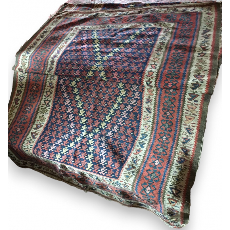 Red and blue kilim rug at  Moinat SA  - Antiques and home décor