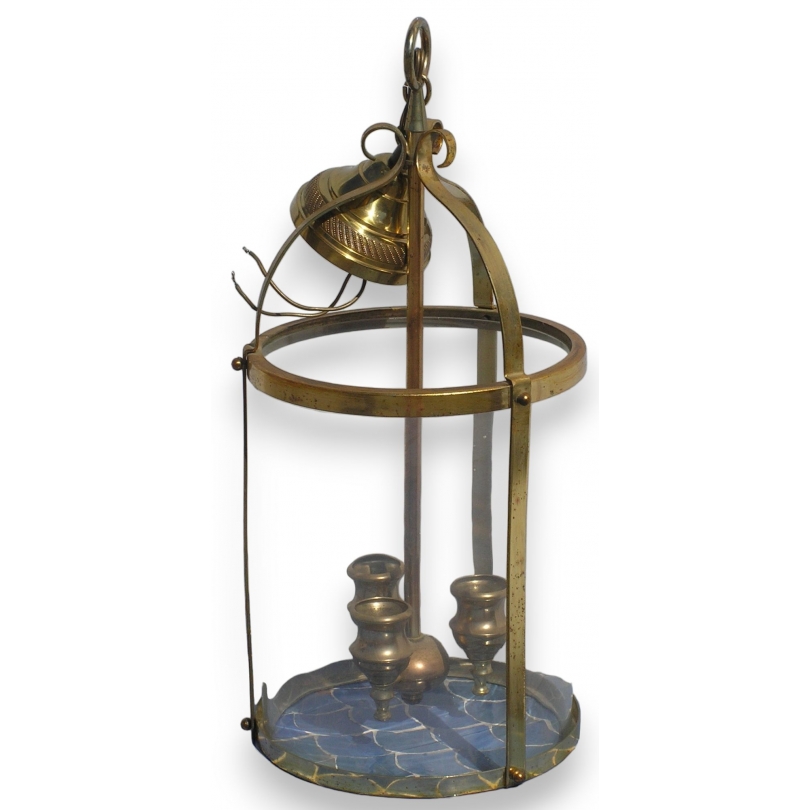Round three-light brass lantern. Available from  Moinat SA  - Antiques and home décor