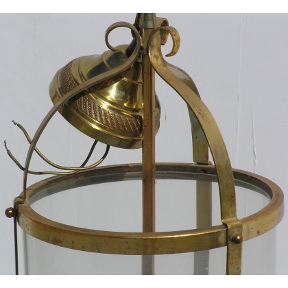Round three-light brass lantern. Available from  Moinat SA  - Antiques and home décor