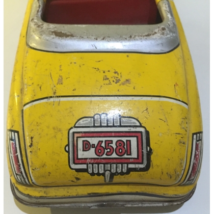  Voiture en tôle à moteur à remonter sur  Moinat SA  - Antiquités décoration