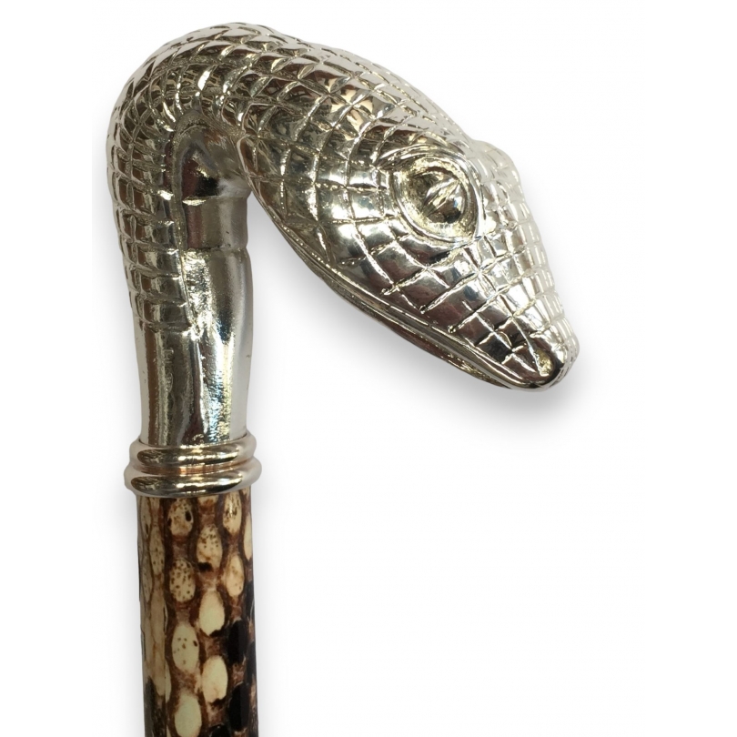  Canne imprimée serpent avec crosse sur  Moinat SA  - Antiquités décoration