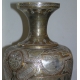 Vase daté 1951, en laiton repoussé.