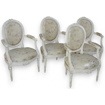 Set of four Louis XVI medallioon armchairs.