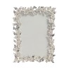 Cadre photo Fleurs émaillées crème sur Moinat SA  - Antiquités décoration 