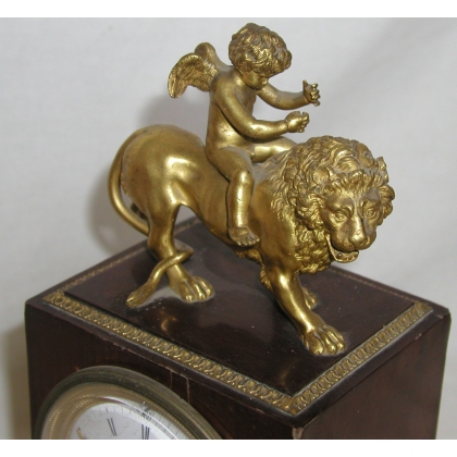 Empire-style lion clock, signed Dubuc Jeune. At Moinat SA – Antiques and Decor