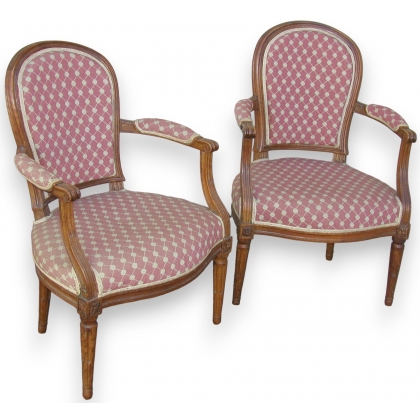 Paire de fauteuils Louis XVI fer à cheval.