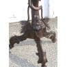 Baroque-style side table with Venetian candlestick holder. Available from Moinat SA – Antiques and home décor