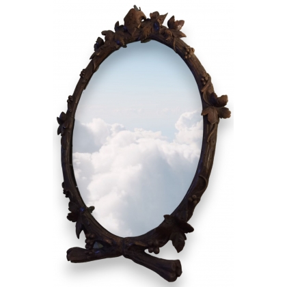  Miroir ovale en bois sculpté de Brienz sur  Moinat SA  - Antiquités décoration
