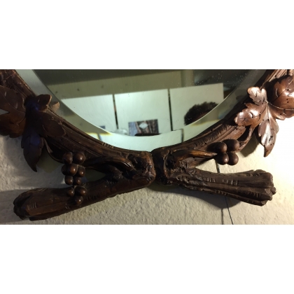  Miroir ovale en bois sculpté de Brienz sur  Moinat SA  - Antiquités décoration