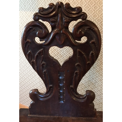 A richly carved walnut Escabelle chair from  Moinat SA  - Antiques and interior design