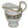 Pot à lait recollé. Décor Meissen de fleurs.