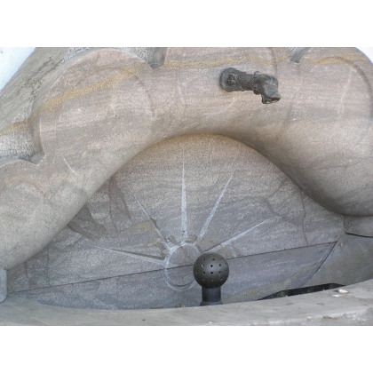 Half-moon wall fountain, made of Sous-Vent stone. Available from Moinat SA – Antiques and Decor