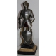 Model reduces to a neo-gothic a medieval armor