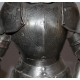 Model reduces to a neo-gothic a medieval armor