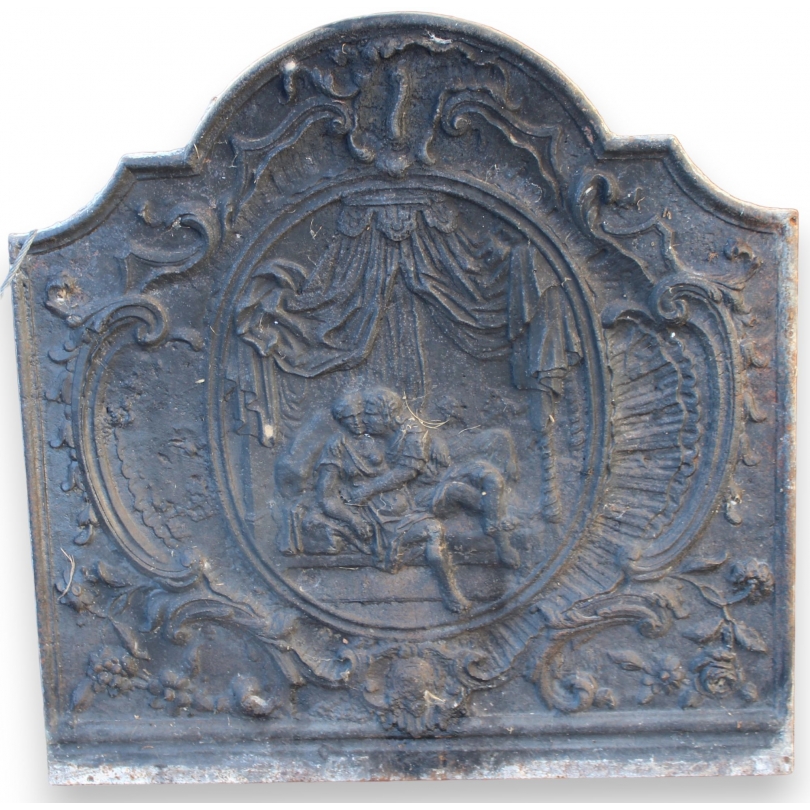 Plaque de cheminée style Régence en fonte