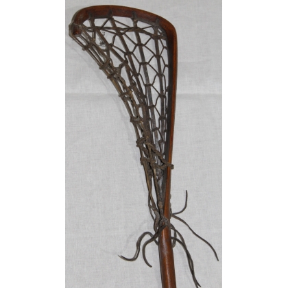 Wooden lacrosse stick with leather net at  Moinat SA  - Antiques and home décor