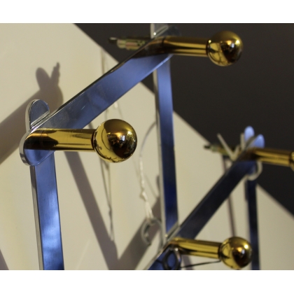Coat rack in nickel-plated iron and gilded brass at  Moinat SA  - Antiques and home décor