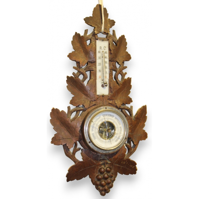 Barometer – carved wooden thermometer from L'Etivaz, available from Moinat SA – Antiques and home décor