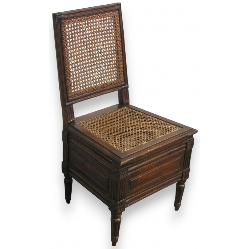 Louis XVI cane-seated toilet chair. Available from Moinat SA – Antiques and home décor