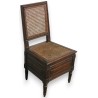 Louis XVI cane-seated toilet chair. Available from Moinat SA – Antiques and home décor