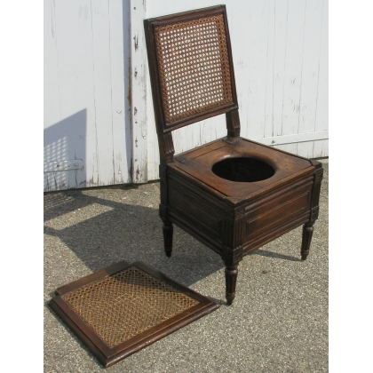 Louis XVI cane-seated toilet chair. Available from Moinat SA – Antiques and home décor