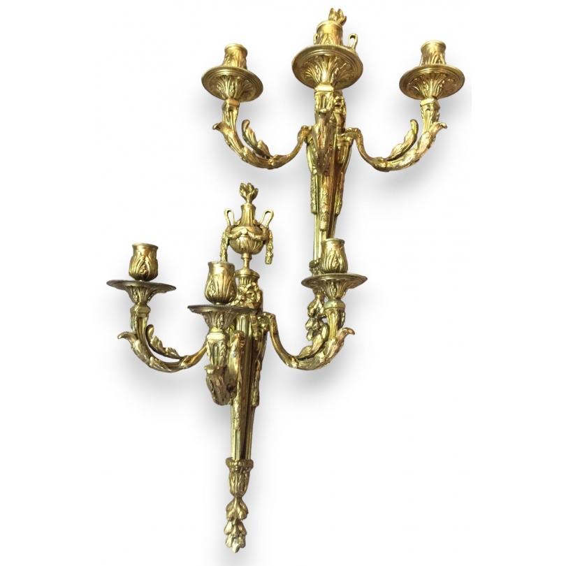 Pair of Louis XVI wall lights with three bulbs. From Moinat SA – Antiques and home décor