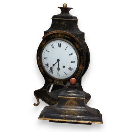 Black Neuchâtel-style clock with gold-coloured rose motifs at  Moinat SA  - Antiques and home décor
