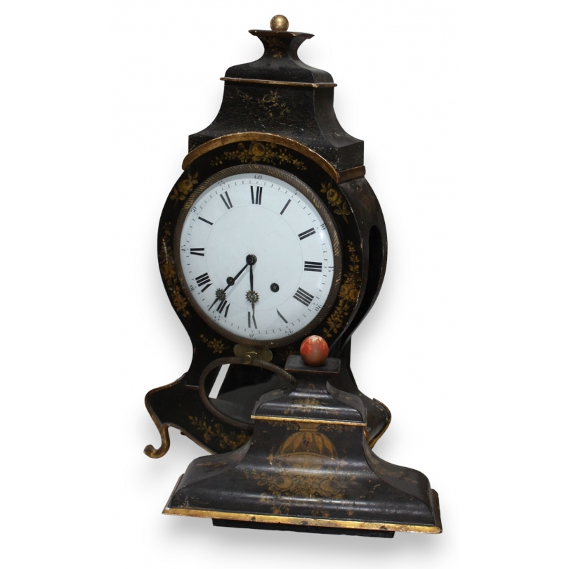 Black Neuchâtel-style clock with gold-coloured rose motifs at  Moinat SA  - Antiques and home décor