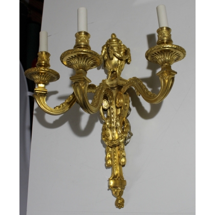 Pair of Louis XVI-style wall sconces in gilded bronze by  Moinat SA  - Antiques and home décor