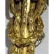 Paire d'appliques style Louis XVI en bronze doré