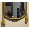  Miroir rectangulaire doré orné de passementerie sur  Moinat SA  - Antiquités décoration