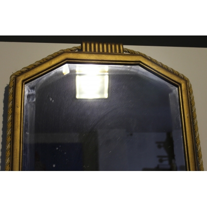  Miroir rectangulaire doré orné de passementerie sur  Moinat SA  - Antiquités décoration