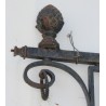 Cast-iron candlestick topped with a pine cone at  Moinat SA  - Antiques and home décor