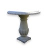 Vicenza stone round table at  Moinat SA  - Antiques and home décor