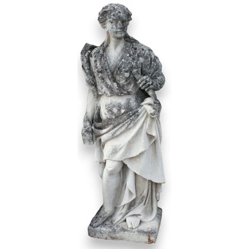 Stone sculpture entitled ‘Woman with a Hammer’ at Moinat SA – Antiques and Decor