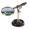 Wooden-handled magnifying glass with a polished brass stand at  Moinat SA  - Antiques and home décor