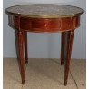  Table bouillotte Louis XVI à 4 pieds sur  Moinat SA  - Antiquités décoration