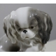 Chien Cavalier pékinois en porcelaine