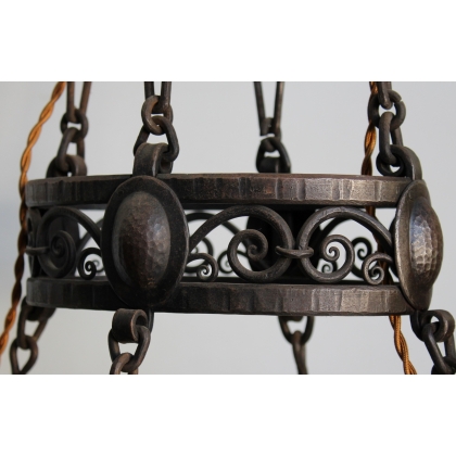 Wrought-iron and bronze chandelier at  Moinat SA  - Antiques and home décor