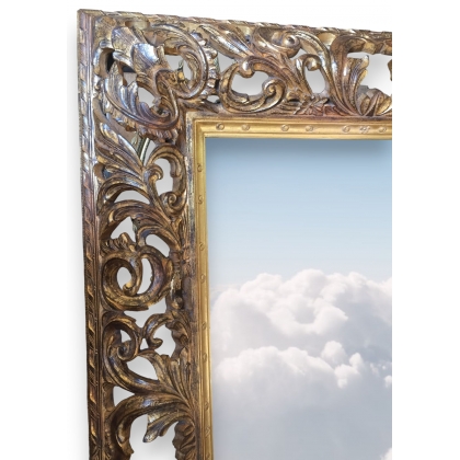 Grand miroir, cadre en bois sculpté doré
