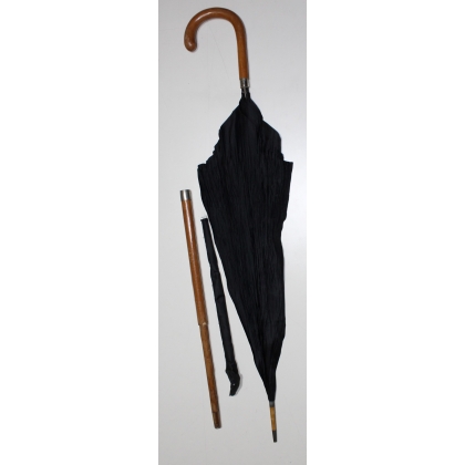  Canne parapluie à étui télescopique sur  Moinat SA  - Antiquités décoration