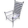  Fauteuil bas de jardin en fer forgé noir sur  Moinat SA  - Antiquités décoration