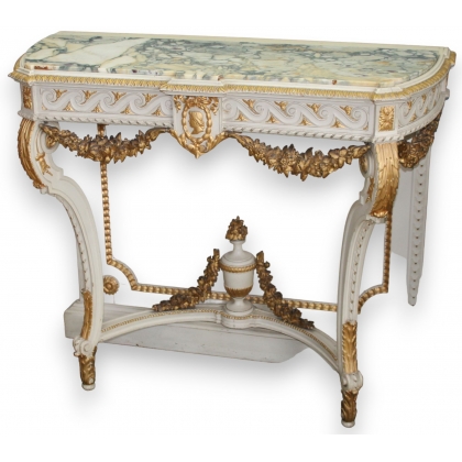 A richly carved Louis XVI-style console table by Moinat SA – Antiques and home décor