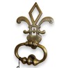 Rustic-style door knocker in aged brass at  Moinat SA  - Antiques and home décor