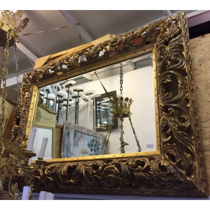  Grand miroir, cadre en bois sculpté doré sur  Moinat SA  - Antiquités décoration