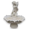  Fontaine Putto en pierre taillée de Vicenza sur  Moinat SA  - Antiquités décoration