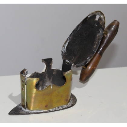 Iron made of brass, copper and iron