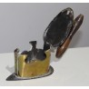 Iron made of brass, copper and iron